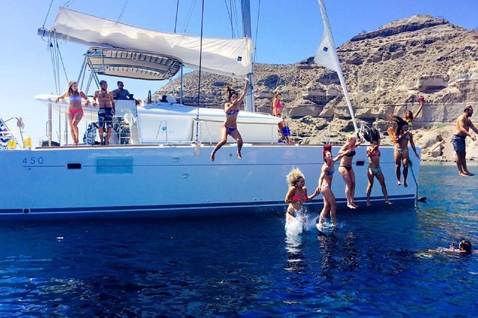 Santorini Catamaran Cruise with Fresh Meal and Open Bar - Hot springs off Palea Kameni: the swim you’ll remember