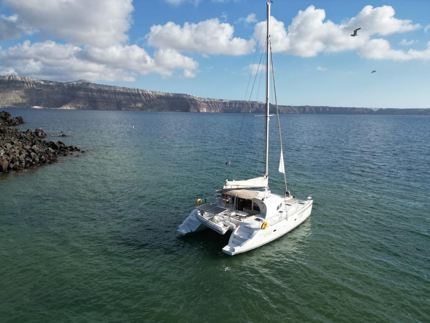 Santorini: Catamaran Cruise with Greek BBQ and Drinks - Caldera views plus Akrotiri photo stops: where Santorini looks cinematic