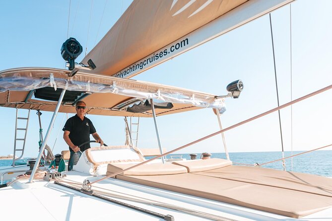 Santorini Catamaran Cruise: with Lunch, BBQ, Open Bar, Transfers - Transfers, group size, and your stress level on a Santorini day
