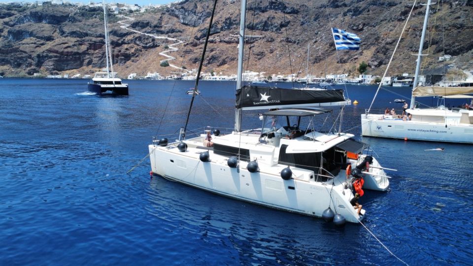 Santorini: Catamaran Cruise with Lunch, Drinks, & Oia Visit - Volcano photo stop, then the caldera cruise with drinks