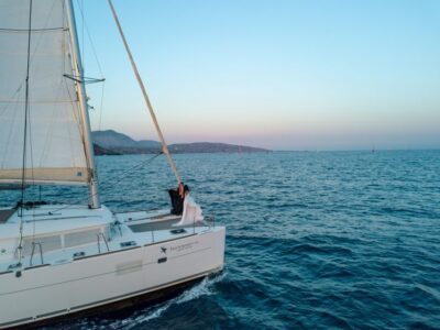 Santorini Catamaran Cruise with Swimming, Meal and Open Bar - Red Beach and White Beach: swimming where the scenery looks volcanic