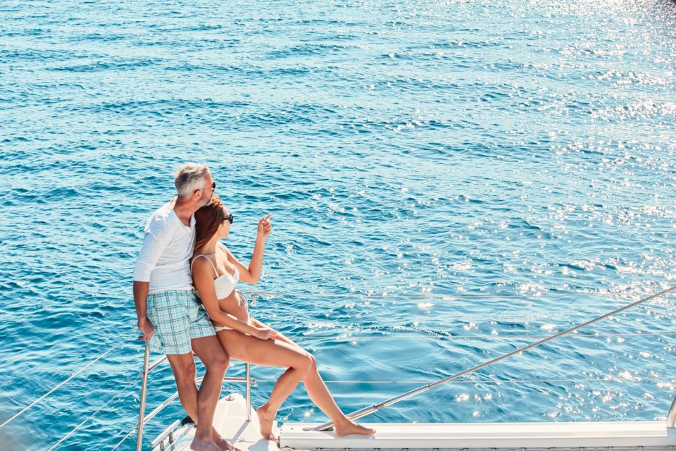 Santorini: Catamaran Tour with BBQ Meal and Unlimited Drinks - Sailing Past Santorini’s Icons Between Swim Stops