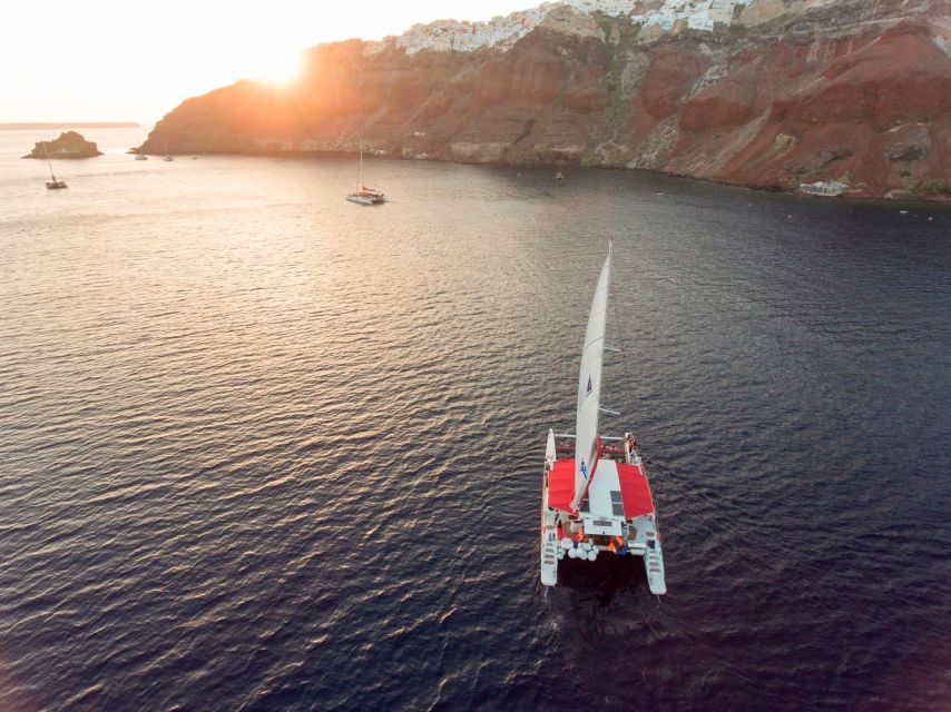 Santorini: Cruise Catamaran with BBQ & Drinks Day or Sunset - White Beach and the BBQ moment: photos, snorkel gear, and local food