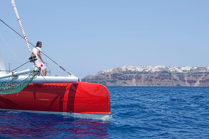 Santorini Cruise on Catamaran with BBQ & Open Bar - Safety and Comfort: The Stuff That Makes Swimming Actually Easy