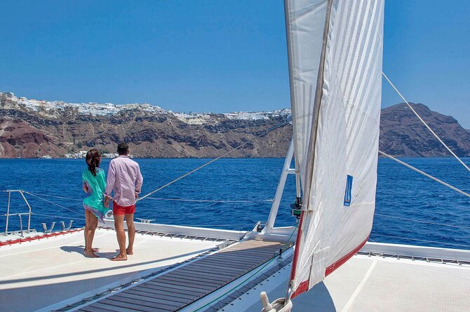 Santorini Cruise on Catamaran with BBQ & Open Bar - The Boat Experience: Deck Space, 360° Views, and Open Bar