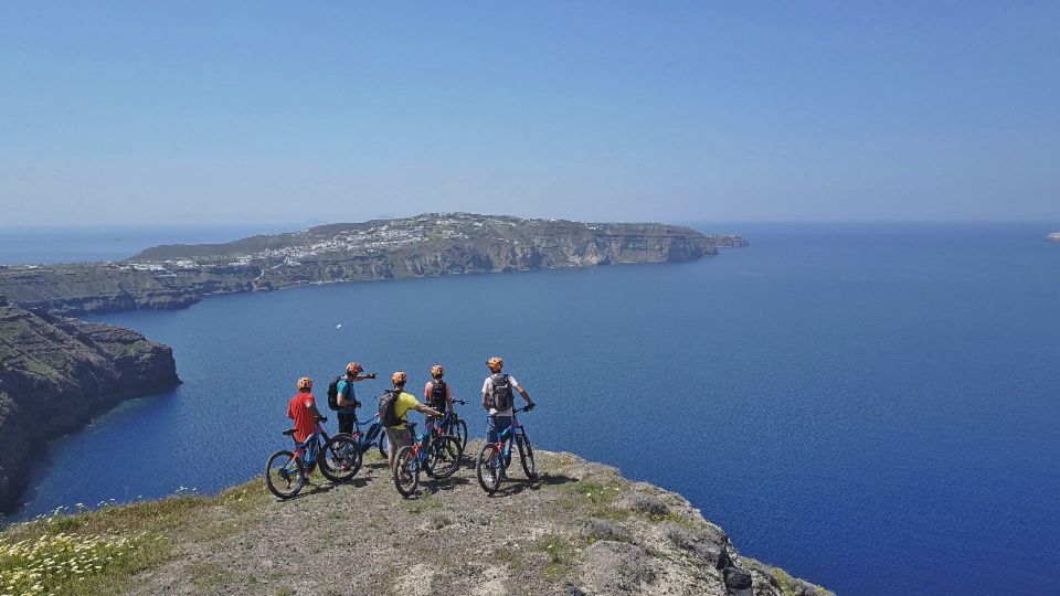 Santorini: Electric Mountain Bike Adventure - Passing ancient Thira and heading toward Emporeio’s medieval maze