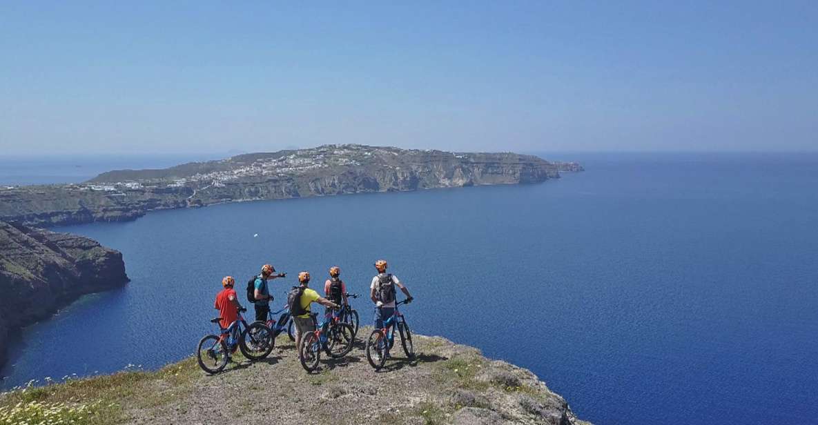 Santorini: Electric Mountain Bike Adventure - Starting at Perivolos: black-sand beach warm-up and easy momentum