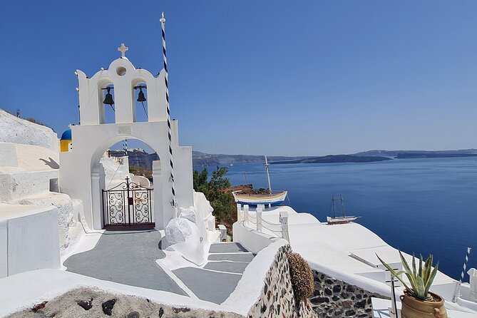 Santorini First-Time Guests Private Tour Sightseeing, excavetions & wine testing - Megalochori: Traditional Village Quiet, Cave Houses, and Vineyard Country
