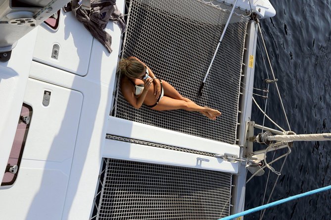 Santorini Full Day Catamaran Private Cruise incl. Meal, Drinks & Free Transport - Catamaran Day Trip Basics: What You’re Actually Buying