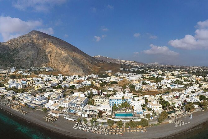 Santorini Full-Day Private Experience Wine Tasting Included - Megalochori: traditional streets and nearby winery logic
