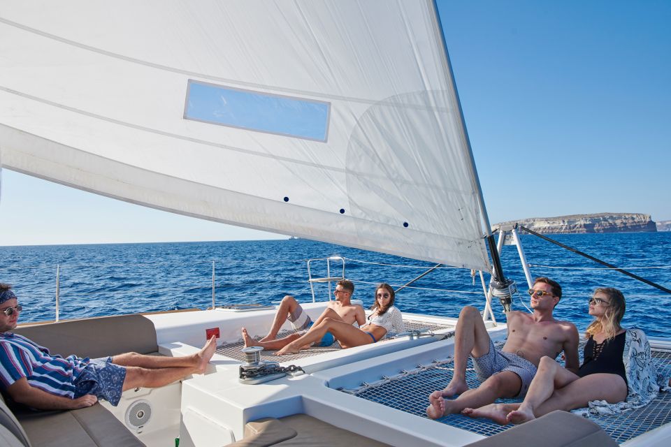 Santorini Gold Catamaran Cruise with Snorkel, BBQ & Open Bar - Mesa Pigadia Beach + BBQ lunch: eat well, then decide your swim time