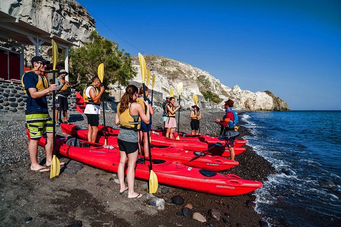 Santorini Guided Sea Kayaking with Light Lunch and Pick-up Option - The sea cave visit and snorkeling: do both if you can swim