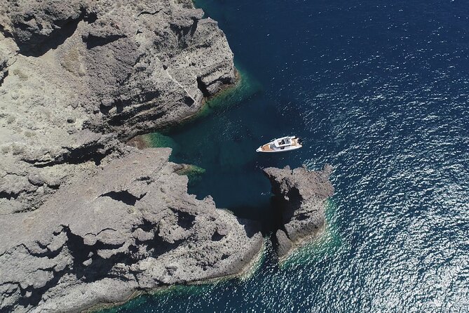 Santorini Half Day MotorCruiser Private Cruise incl. Meal,Drinks &Free Transport - Vlihada Port start: the calm launch point on the south side
