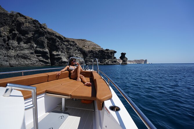 Santorini Half Day MotorCruiser Private Cruise incl. Meal,Drinks &Free Transport - Oia, Imerovigli, and Firostefani: seeing Santorini from the waterline