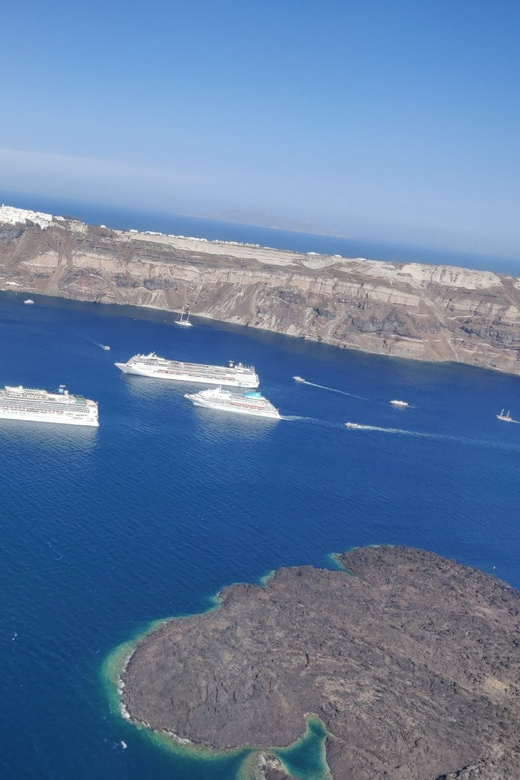 Santorini: Helicopter Sightseeing Flight Over Caldera - Oia and Fira from above: cliff towns in one pass