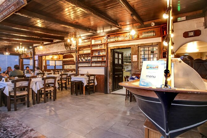 Santorini Highlights Small-Group Tour with Authentic Greek Lunch - Perivolos Black-Sand Beach and the Included Greek Lunch
