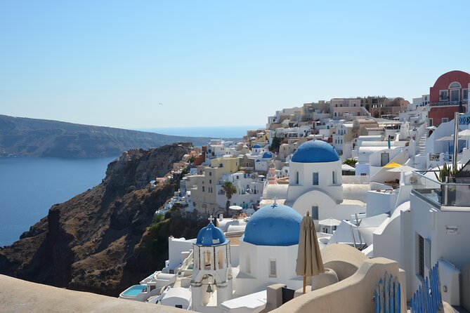 Santorini Highlights Small-Group Tour with Wine Tasting option - Oia’s Main Street walk: iconic walls, smart photo pacing, and time to wander
