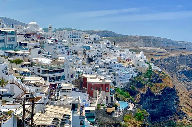 Santorini: Local Life Full Day Tour - Oia’s walking start: blue domes, cave houses, and viewpoint time