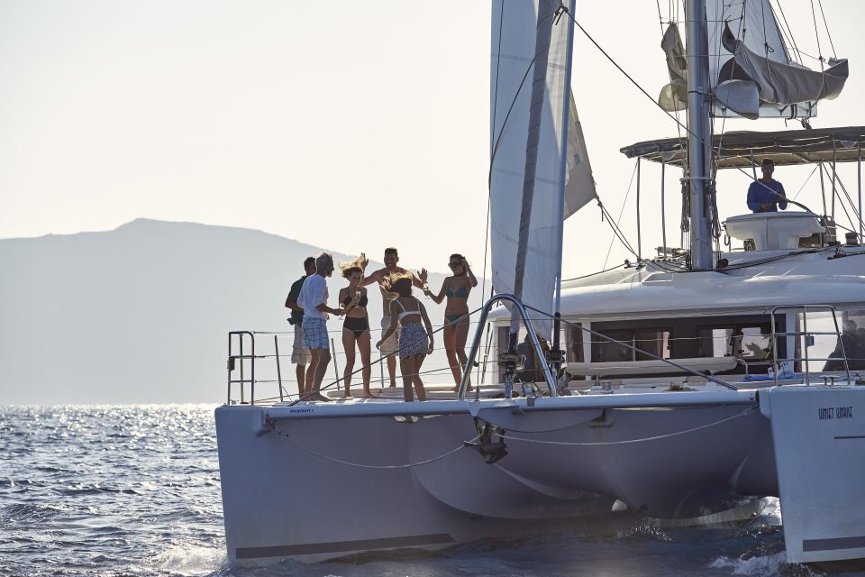 Santorini: Luxurious Catamaran Cruise with Meal & Open Bar - When weather turns: how to handle wind and choppy water