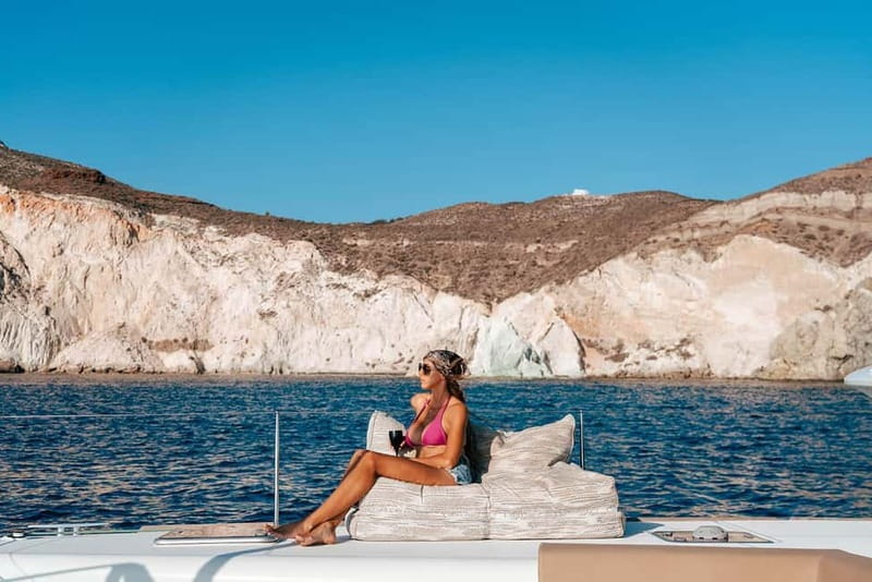 Santorini: Luxury Catamaran Cruise with Lunch, BBQ & Drinks - Vlychada to the Red and White beaches: photos from the water, plus swim chances