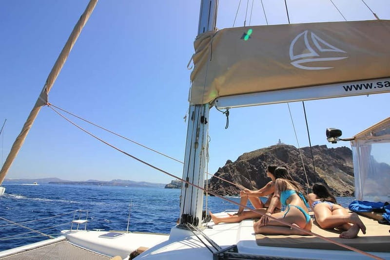 Santorini: Luxury Catamaran Cruise with Lunch, BBQ & Drinks - Mesa Pigadia swim stop: clear water, beach vibes, and a good break from sailing