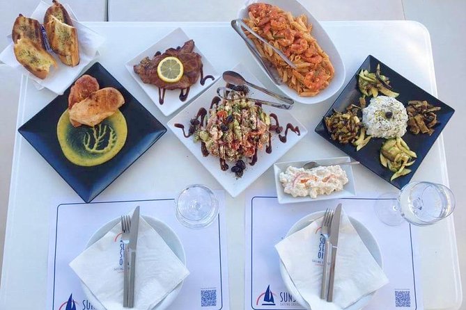 Santorini Luxury Catamaran Day Cruise with BBQ,drinks,transfer - Red Beach stop: short swim, big visual payoff