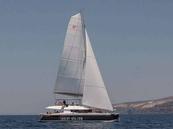 Santorini Luxury Catamaran Day Cruise with BBQ,drinks,transfer - Hot Springs swim: fun, quick, and bring a color choice