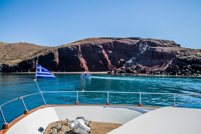 Santorini: Motor Yacht Private Cruise with 5-Course Meal - White Beach stop: similar timing, different look