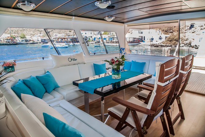 Santorini: Motor Yacht Private Cruise with 5-Course Meal - Sailing past the big Santorini icons before you even eat