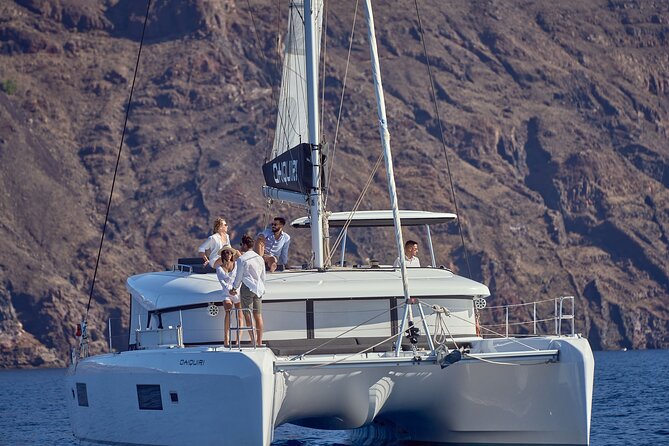 Santorini Oia: Caldera Luxury Day Cruise with BBQ & Drinks - Nea Kameni: the longer swim-and-snorkel block plus your lunch