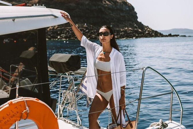 Santorini Oia: Private Sunset Catamaran Cruise with BBQ & Drinks - Food and drinks on board: BBQ, Greek salads, and unlimited local wine