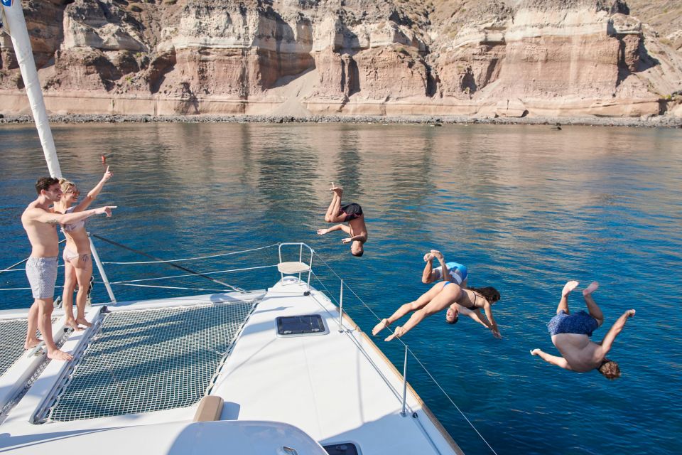 Santorini: Platinum Catamaran Cruise w/ BBQ Meal & Open Bar - Red Beach to White Beach: Fast Photo Stops With Real Context