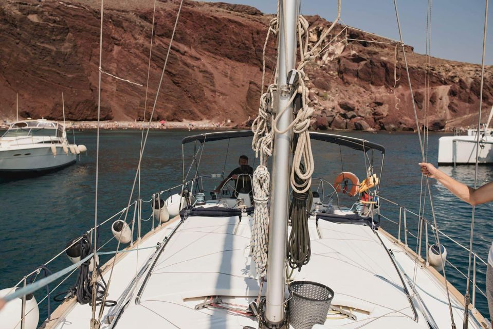 Santorini: Private 5-Hour Sunset Sailing Tour with Dinner - Sunset timing and steering the wheel when the sea cooperates