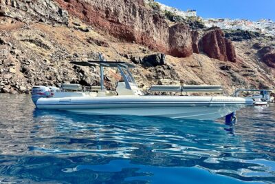 Santorini private boat tour - Stop 1: Santorini Volcano for a sharper Caldera perspective