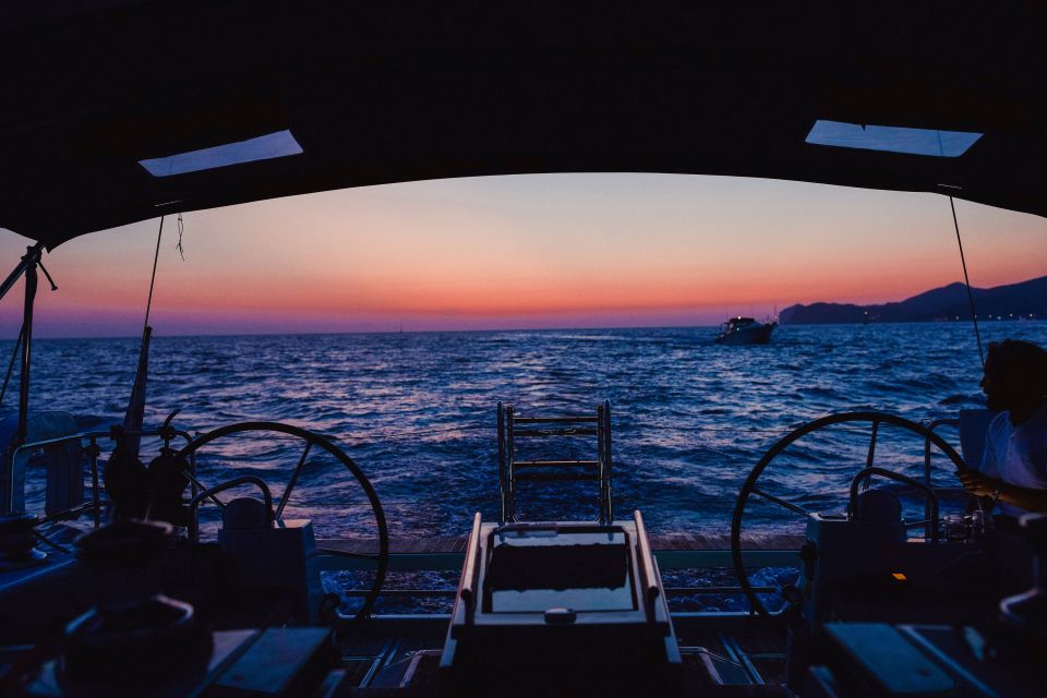 Santorini: Private Caldera Sailing Trip with Open Bar & Meal - Entering the caldera near the Venetian Lighthouse