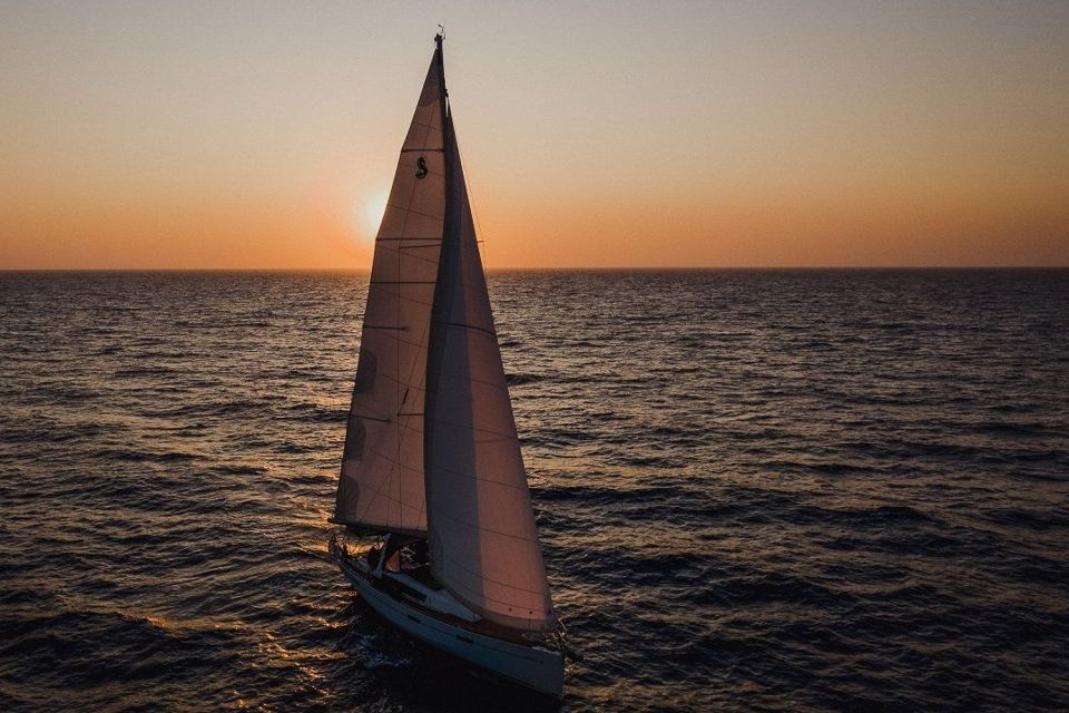Santorini: Private Caldera Sailing Trip with Open Bar & Meal - The geothermal hot springs swim (and why it feels special)