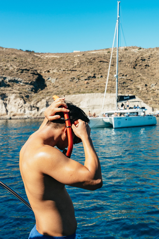 Santorini: Private Catamaran Tour with BBQ Meal and Drinks - Why a private Santorini catamaran beats the busy caldera