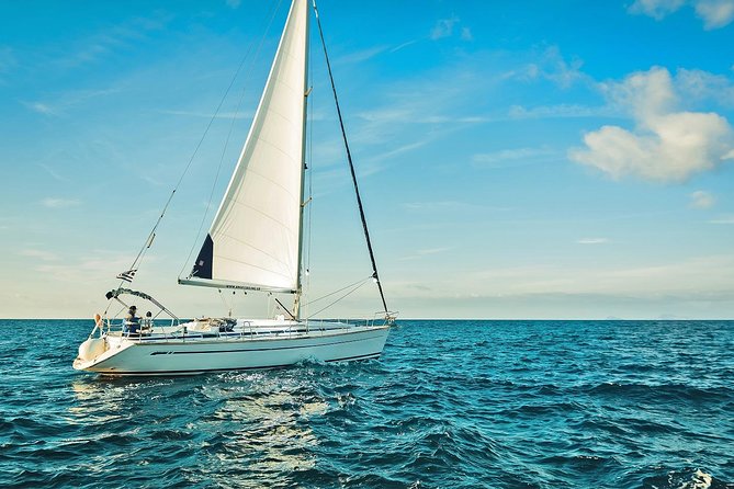 Santorini Private Daytime Sailing Cruise with Meal, Drinks &Transfer included - Volcano Between Two Passages: Hot Springs, Cape Lighthouse, and Caldera Views