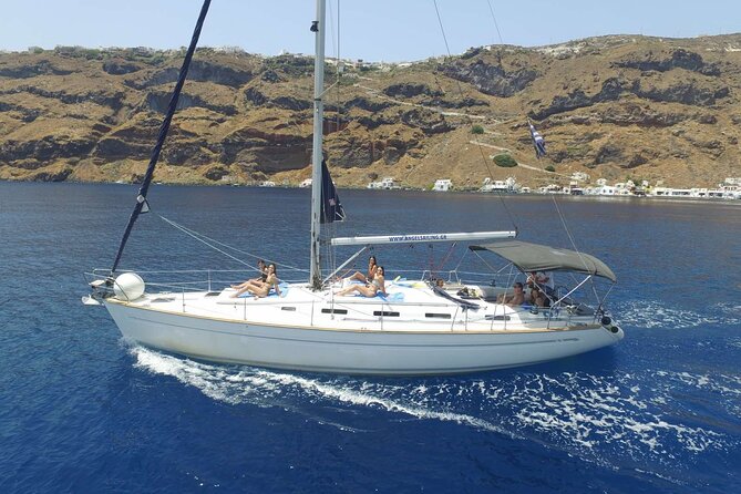 Santorini Private Daytime Sailing Tour with Meal, Drinks &Transfer included - Volcano crossings: lighthouse, hot springs, and the caldera view angle that counts
