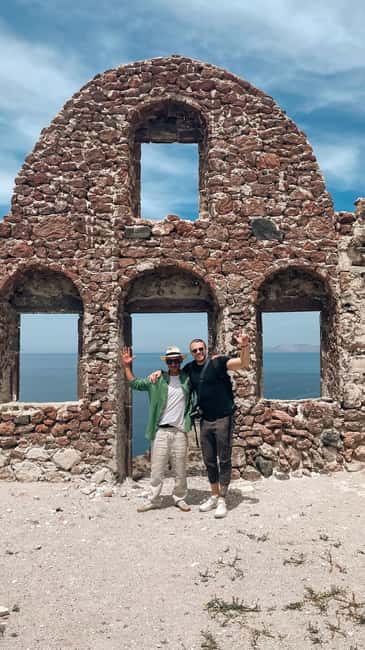 Santorini : Private Guided Highlights Tour - Stop 1: Three Bells of Fira in Firostefani