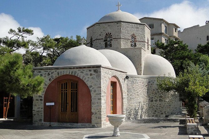 Santorini Private Half-Day Tour with Pickup - Profitis Ilias Monastery: fortress walls and a 1711 backstory