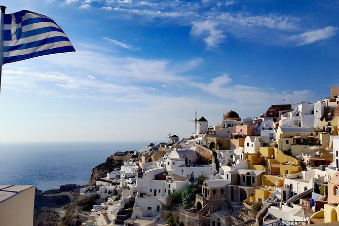 Santorini Private Romantic Tour with Dinner & Wine Tasting - Red Beach: iconic volcanic color in a short 15-minute stop