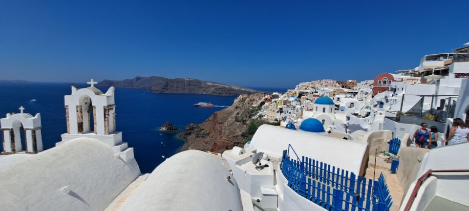 Santorini: Private Sightseeing Half-Day Tour - Red Beach (Akrotiri): volcanic color and sea-meets-rock drama