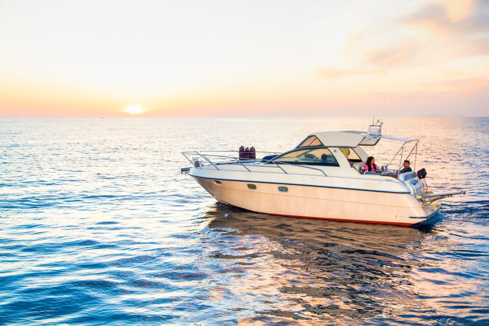 Santorini: Private Sunset Cruise with Barbecue and Drinks - Oia from the water: photos, mood, and how to make the most of it