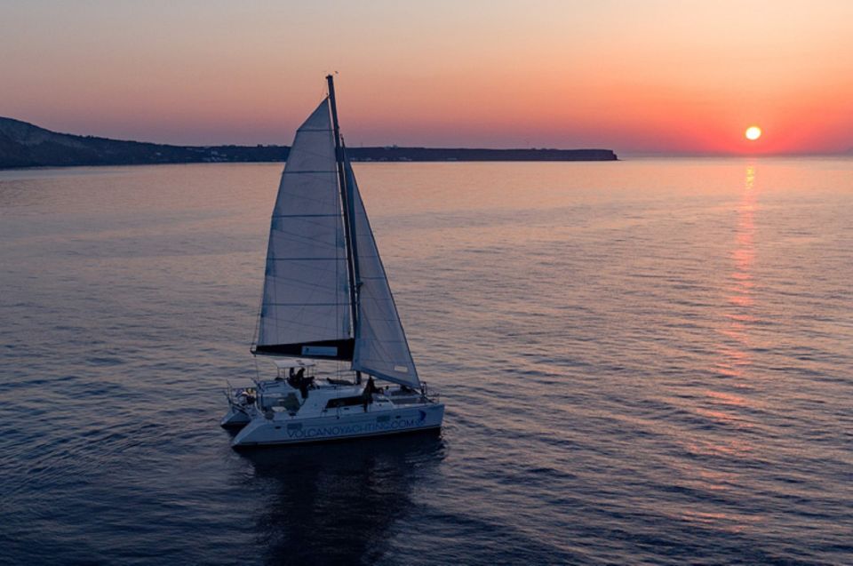 Santorini: Private Sunset Cruise with Dinner and Drinks - The Beach Lineup: Red, White, Black Mountain, and Lighthouse Stops