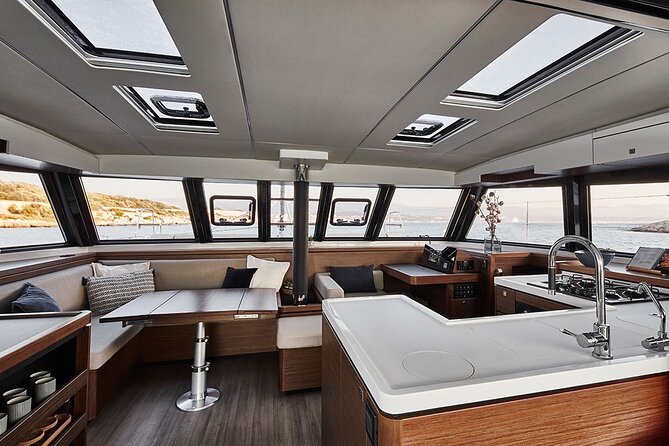 Santorini Private Tour Half-Day Sailing Platinum Catamaran Cruise - Aspronisi (White Island): volcanic geography you can feel