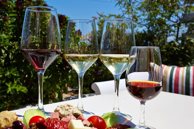 Santorini Private Wine Tasting Experience with private sommelier - Stop 3: Artemis Karamolegos Winery, garden tastings, and cave cellars