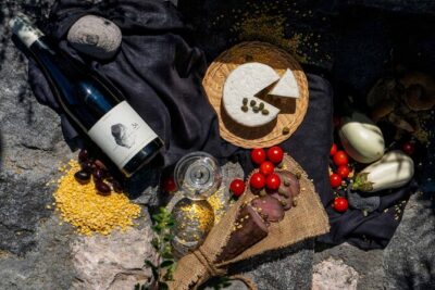 Santorini Private Wine Tour with Dinner & Oia Sunset - Megalochori: traditional village energy and a family winery since the 1950s