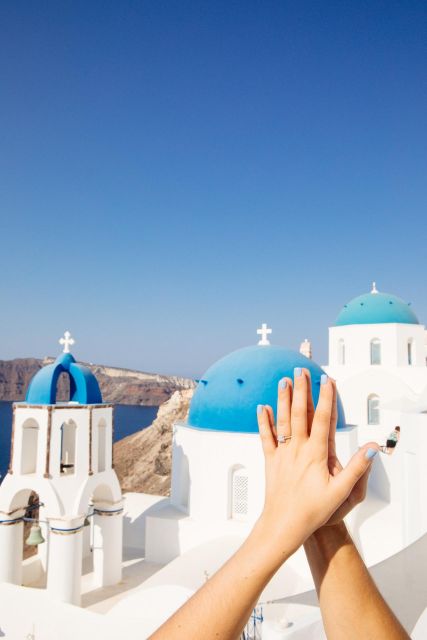 Santorini Proposal: A Luxury Photoshoot for Your Yes! Moment - Location and style: Aegean views, volcanic cliffs, and whitewashed drama