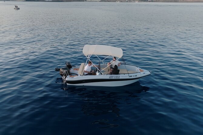 Santorini Rent a Boat - License free private cruise - Thirassia taverna lunch: the break that makes it feel local